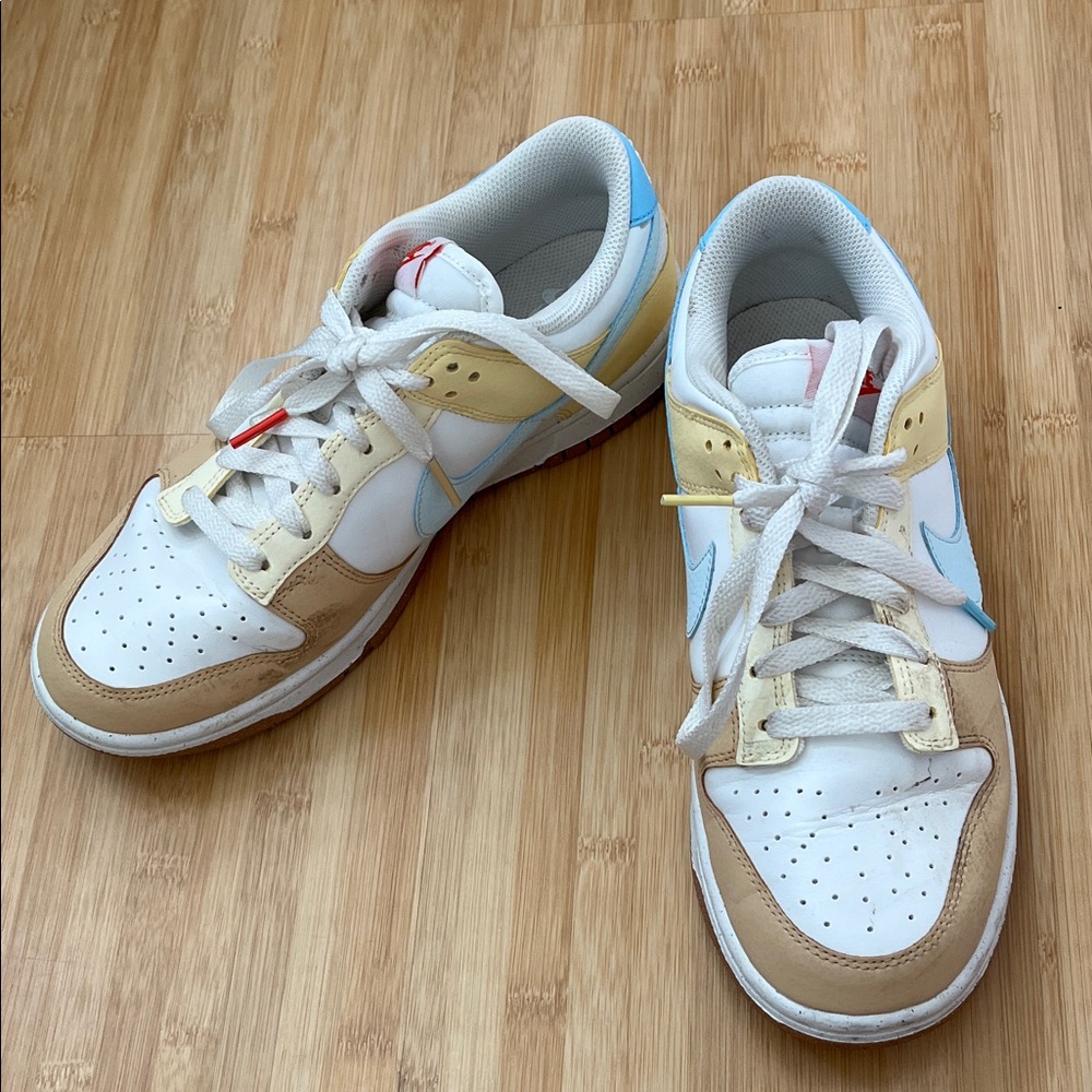 Nike White and Gold Sneakers with Red Logo